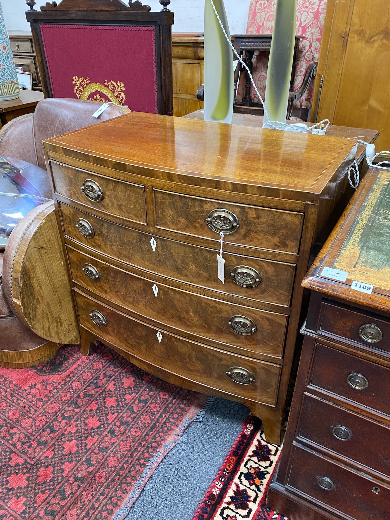 A small Regency and later boxwood strung mahogany bowfront chest, width 78cm, depth 49cm, height 81cm